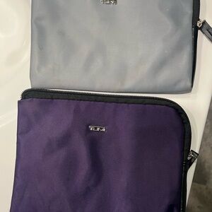 TUMI Gray and Purple Toiletry Bags